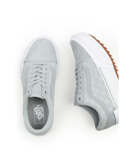 white stacked trainers