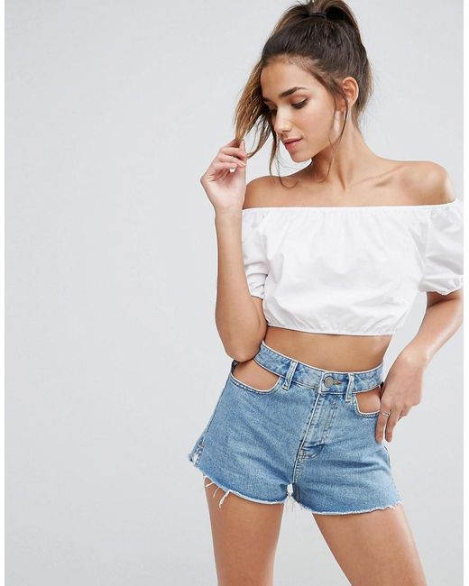 Items in search results Reaffirm positive intentions for every season to come in the Lulus Crystal Grid White Crochet Long Sleeve Crop Top! Loosely crocheted cotton lace travels across a bateau neckline, and long bell sleeves will scalloped hems.