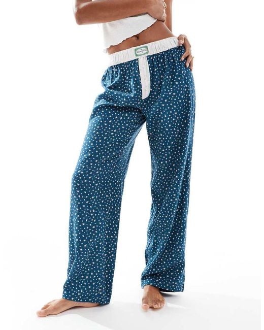 Pantalones De Pijama De Pernera Ancha Con Estampado De Florecitas De Franela De Cotton On-Azul Marino Cotton On de color Blue