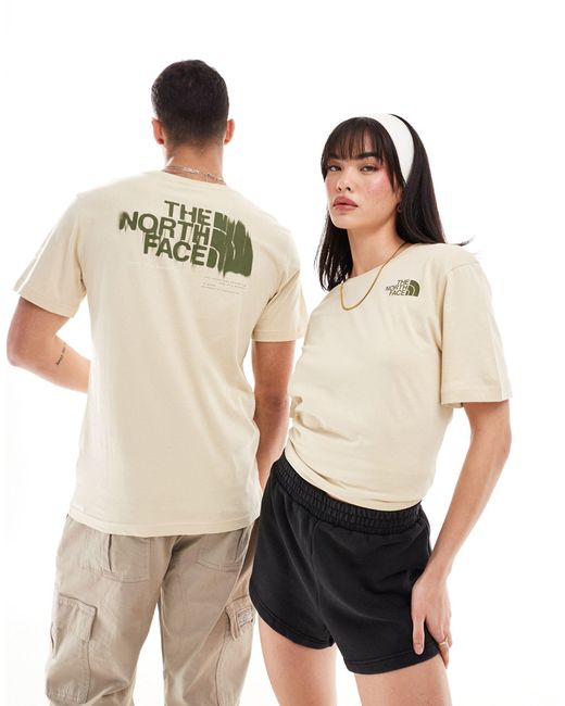 T-shirt beige con grafica stampata sul retro di The North Face in Natural