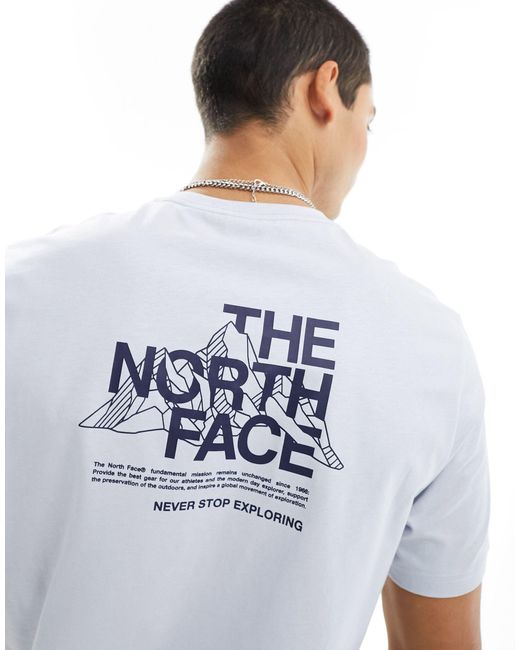 Camiseta azul claro con estampado The North Face de hombre de color White