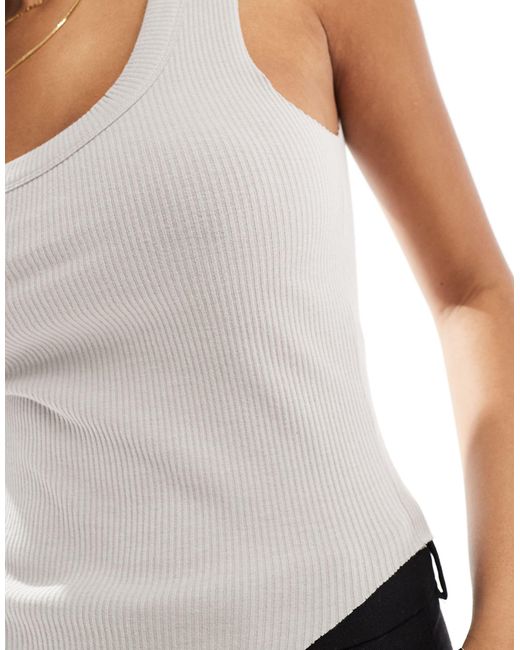 Camiseta sin mangas con cuello ancho, bajo estilo corsé y ribete ancho ASOS de color White