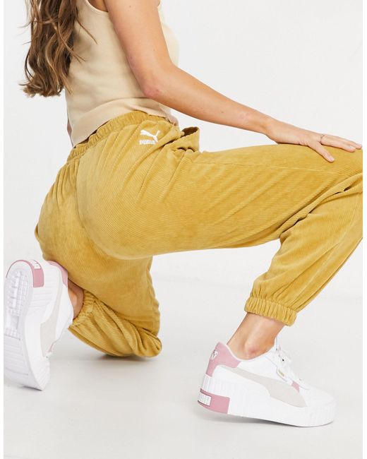 yellow puma joggers