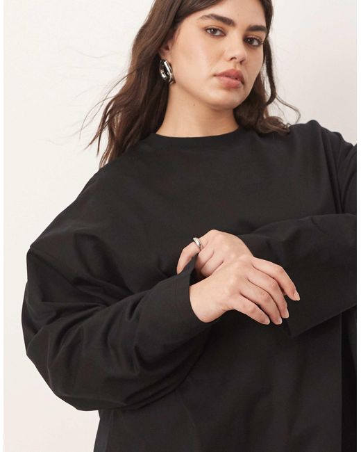 ARRANGE Black Curve – langärmliges oversize-shirt aus baumwolle