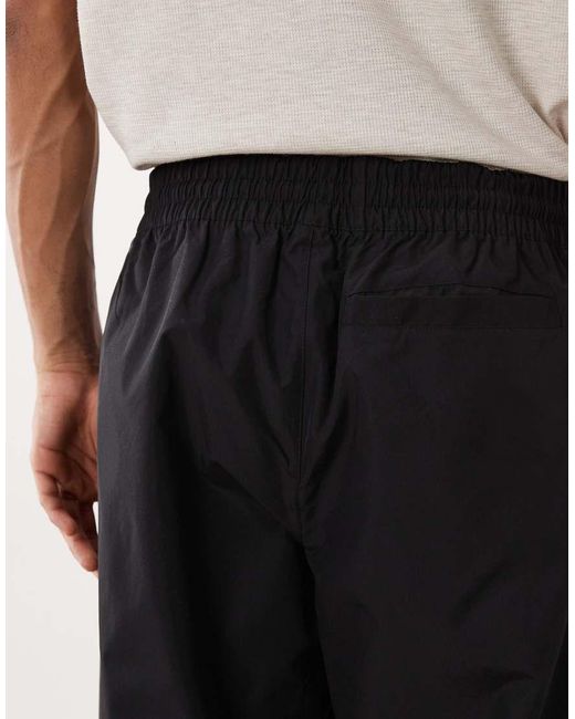 New Balance Black Trackside Woven Pant for men