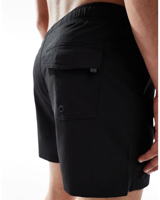 Pull&Bear Textured Swim Shorts With Pockets for men