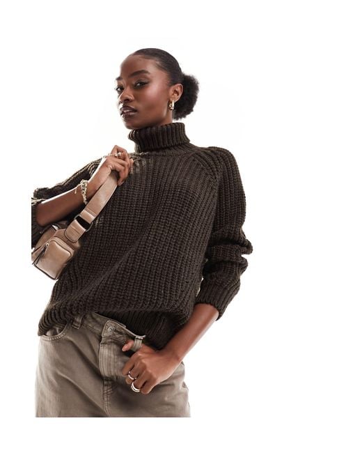 black slouchy roll neck jumper