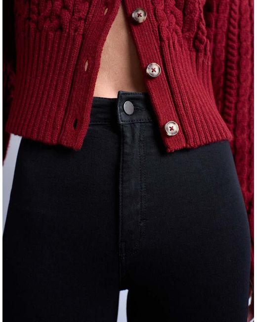 Vaqueros Negros De Corte Superpitillo Y Talle Alto Joni De TOPSHOP de color Black