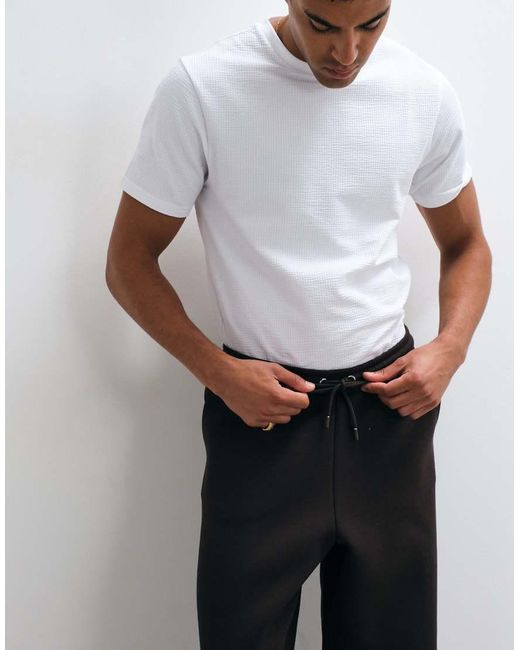 ASOS Gray Relaxed Tapered jogger With Silver Hardware Detail for men