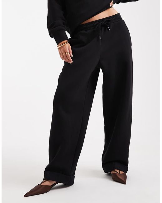 ASOS Black Oversized Brushback Sweatpants With Cuffed Hems Detail