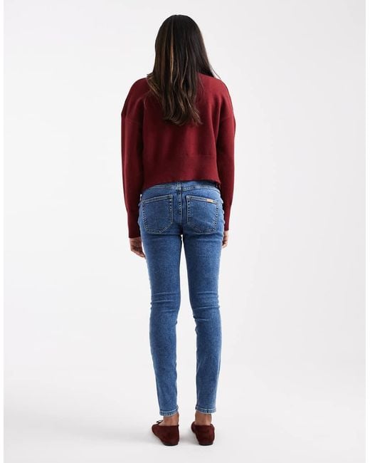 Vaqueros De Corte Pitillo Ultimate De Asos Design Maternity ASOS de color Blue
