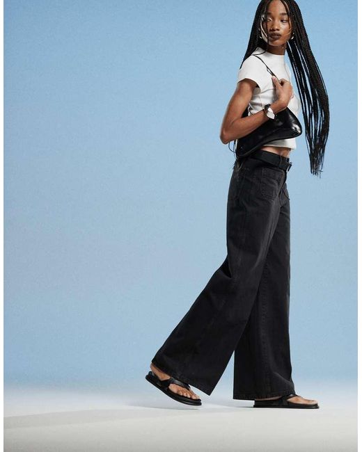 Vaqueros Negros De Pernera Ancha Con Botones Dorados Emma De Mango de color Blue