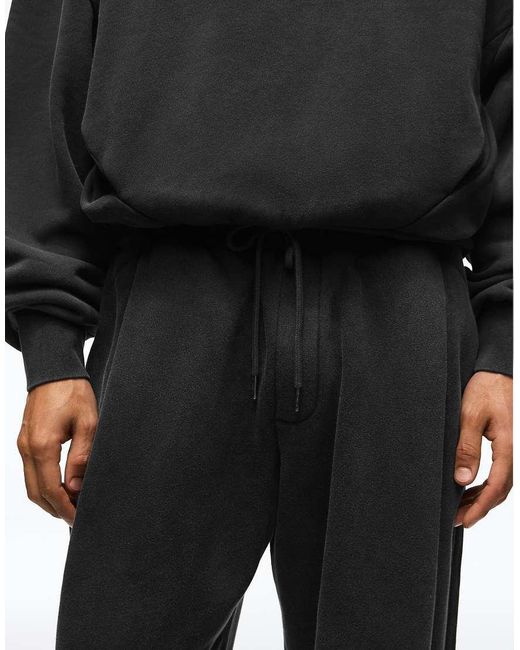 Bershka Black Balloon Fit Washed joggers With Pleats for men