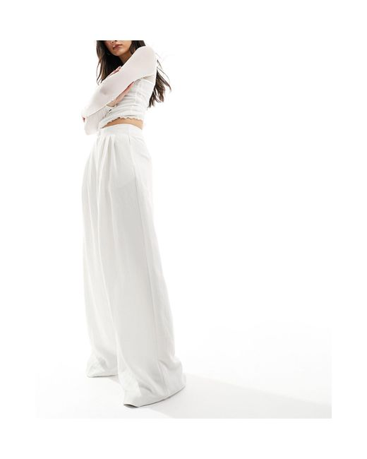 Pantalon plissé coupe ample ajustée - écru Stradivarius en coloris White