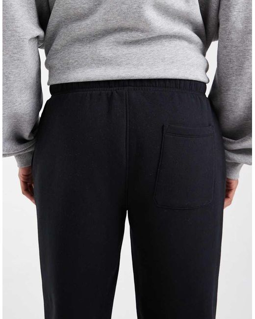 Joggers Negros Básicos De Pernera Recta De ASOS de hombre de color White
