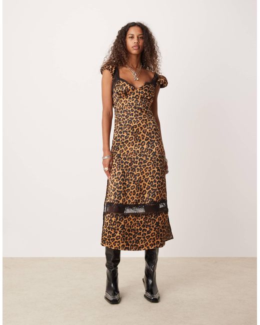 Robe mi-longue à imprimé léopard et bordures dentelle Free People en coloris Natural