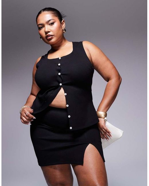 Minifalda Negra Con Abertura En El Bajo De Punto Roma De Asos Design Curve ASOS de color Black