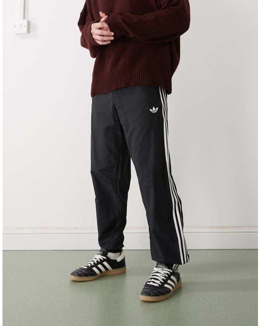 Adidas Originals Black Firebird Woven Track Pants for men