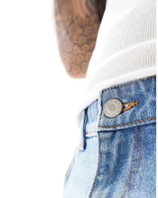 Jeans oversize affusolati lavaggio medio di ASOS in Blue da Uomo
