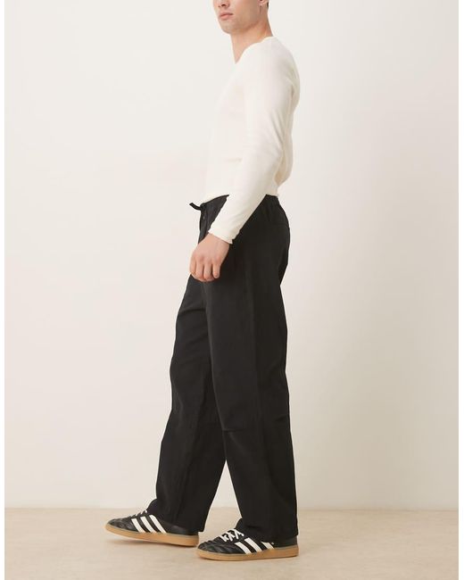 ASOS Black Relaxed Tapered Pull On Pants for men