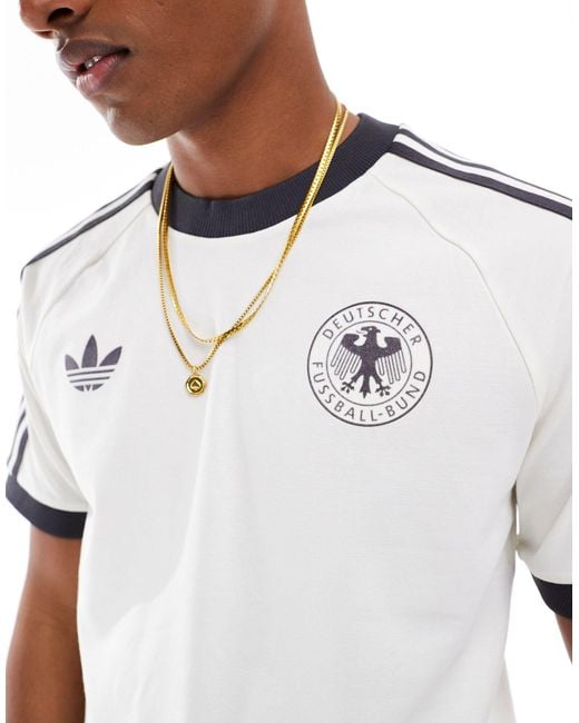 Adidas originals - adicolor - classics 3-stripes germany - t-shirt bianca con tre strisce di Adidas Originals in White