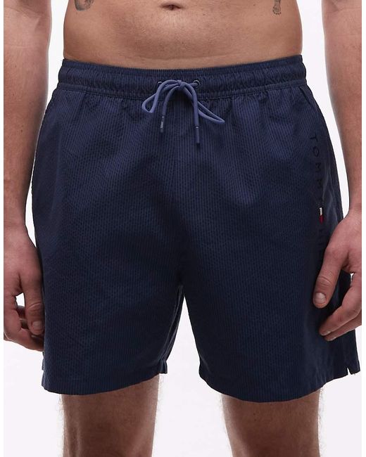 Tommy Hilfiger Blue Textured Drawstring Zip Swim Shorts for men
