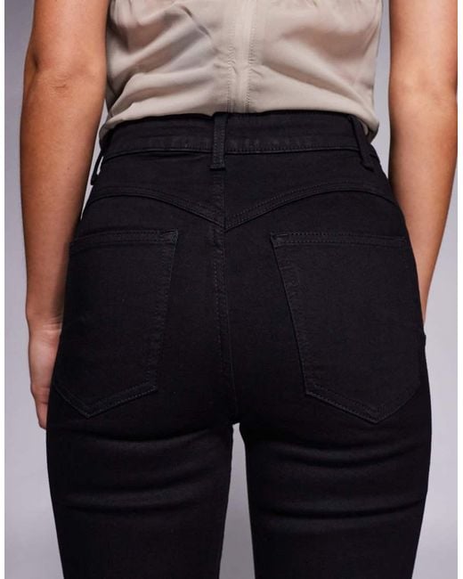 ASOS Black Asos Design Petite Power Stretch Sculpt Flare Jeans