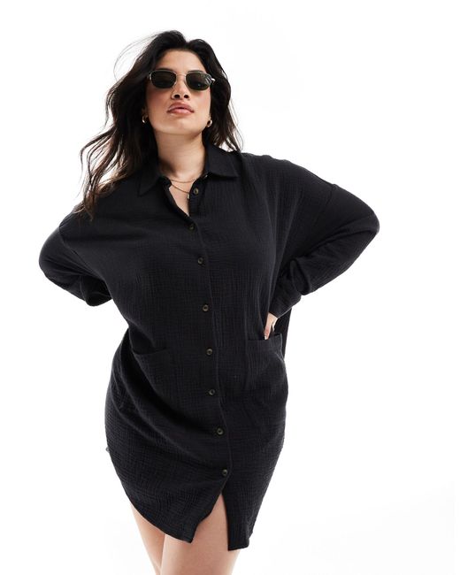Asos design curve - robe chemise oversize en tissu double à poches basses ASOS en coloris Black