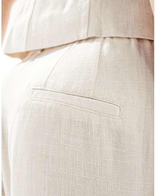 Pantalon chino aspect lin - naturel Stradivarius en coloris White