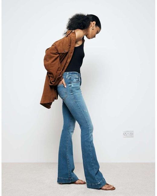 River Island Flared Jeans Met Mid-Wash in het Blue