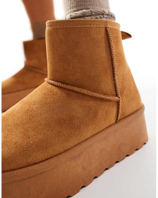 SEQWL White Flatform Boots