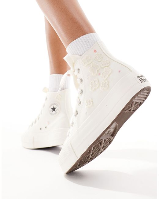 Lift - sneakers crema con suola spessa e fiori di Converse in Natural