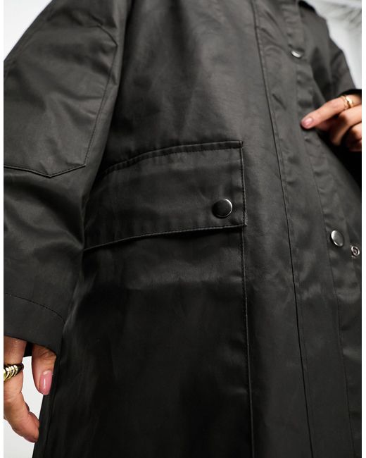Trench-coat ciré avec doublure à carreaux - noir ASOS en coloris Blue