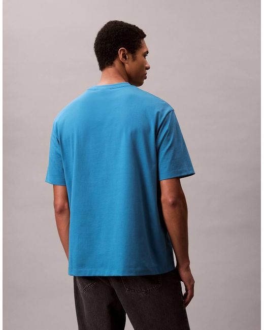 Camiseta Azul Con Logo En La Parte Izquierda Del Pecho De Calvin Klein de hombre de color Blue