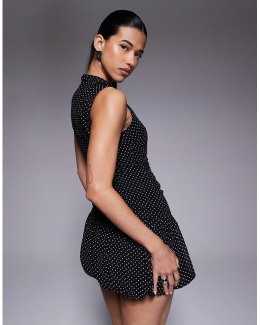 The Frolic Black Exclusive Sleeveless High Neck Pleated Drop Hem Dress