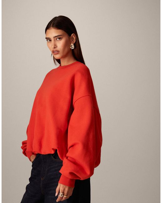 Sweat à ourlet bouffant ARRANGE en coloris Red