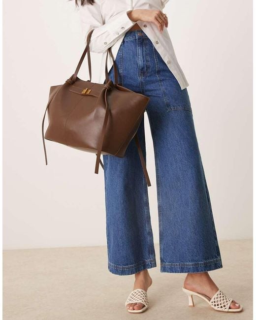 Gina Tricot Blue Faux Leather Medium Tote Bag With Strap And Clutch Detail