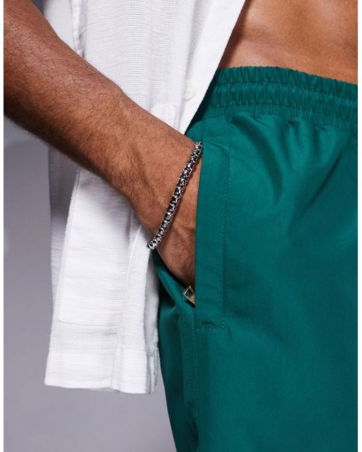 The Couture Club Green Reactive Emblem Swim Shorts for men