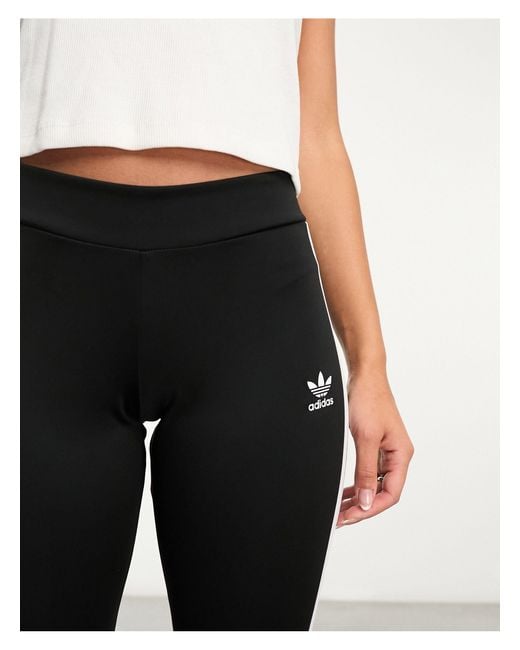 Adidas Originals Black Three Stripe Flared leggings