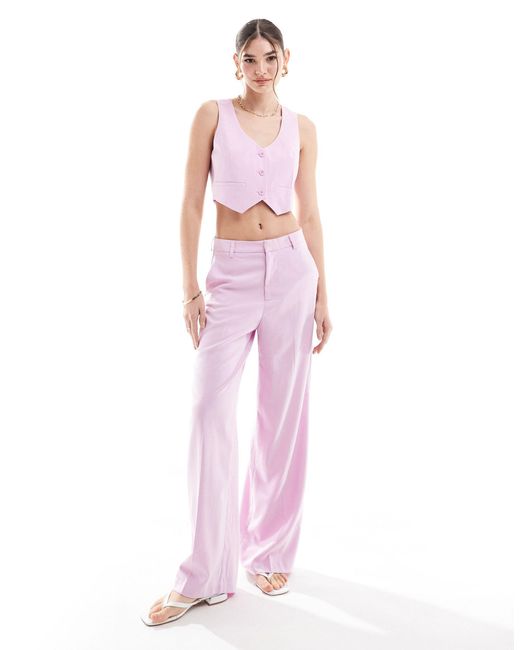 Pantalon d'ensemble ajusté et large à taille haute - clair ONLY en coloris Pink