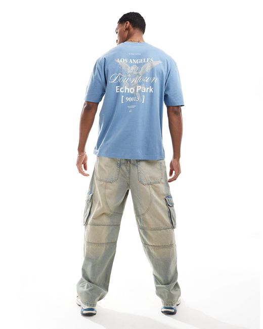 T-shirt oversize con stampa "los angeles" con cherubino sul retro di ASOS in Blue da Uomo