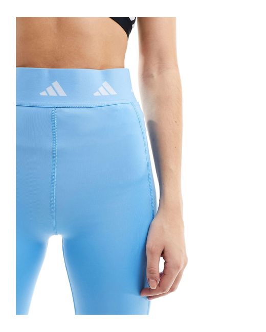 Adidas - training essentials - leggings color acceso con logo sulla fascia di Adidas Originals in Blue