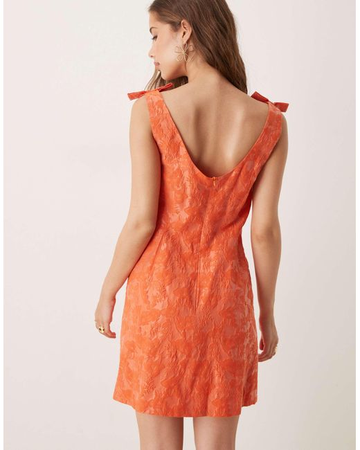 Sister Jane Orange Bow Shoulder Jacquard Mini Dress
