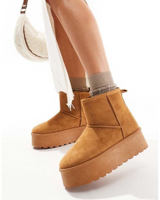 SEQWL White Flatform Boots