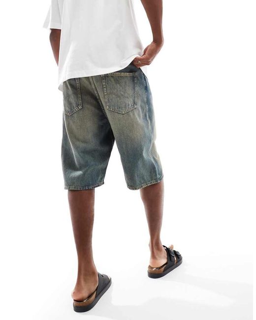 Pantalones Cortos Vaqueros De Corte Skater Alargado Con Lavado Arena Ron De -Azul Jack & Jones de hombre de color Gray