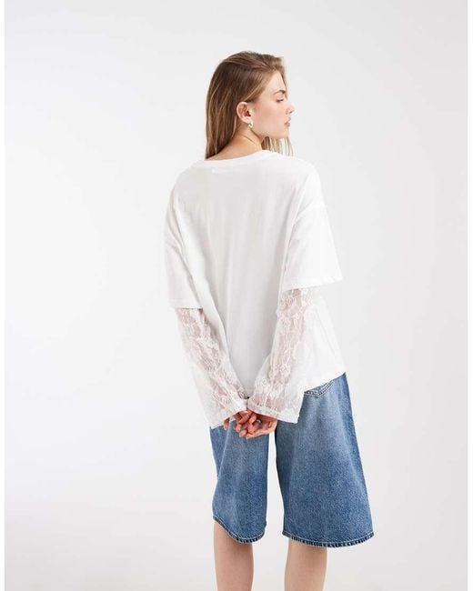 BRONZE SNAKE White Oversized T-shirt With Lace Underlay