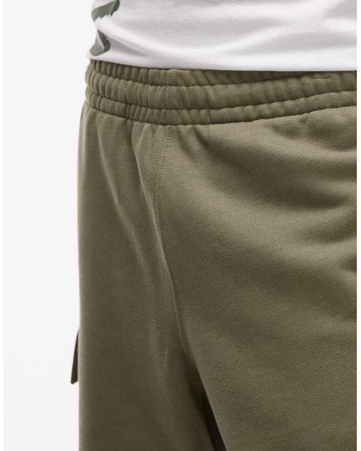 Pantaloncini Cargo Kaki di Lacoste in Natural da Uomo