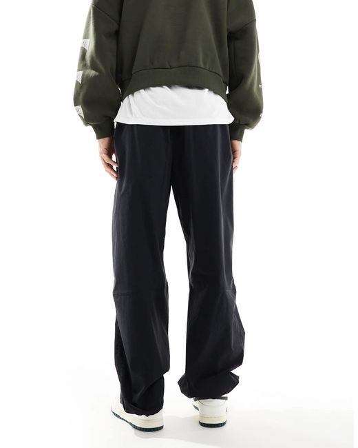 Nike Black Tech Woven Oversized Pants for men