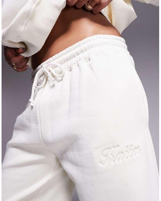 Joggers Amarillo Pastel Con Logo De Texto En Relieve De Tejido Rico En Algodón De (Parte De Un Conjunto)-Blanco Kaiia de color White