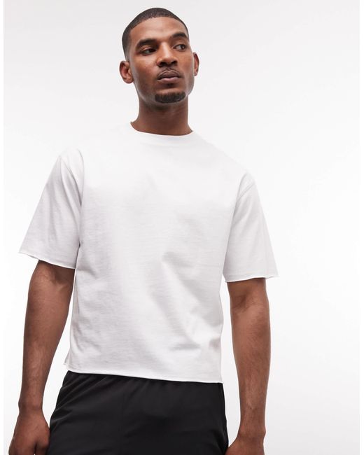 4505 – cropped-trainings-t-shirt aus schnelltrocknender baumwolle in White für Herren